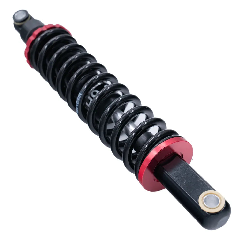 Een close-up van de QMWHEEL S20 (PRO) - VERING - ORIGINEEL schokdemper met spiraalveer van QMWHEEL, uitgevoerd in zwart met rode en zilveren accenten — ideaal als vervangingsonderdeel voor een fatbike of om de originele vering van je fiets te upgraden.